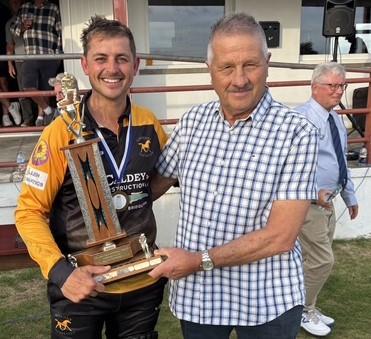 Troy Purslowe receives the man of the match award from sponsor Glyn Cole